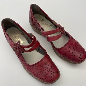 Rieker gorgeous red coloured women’s leather maryjane flats with eyelet detail.